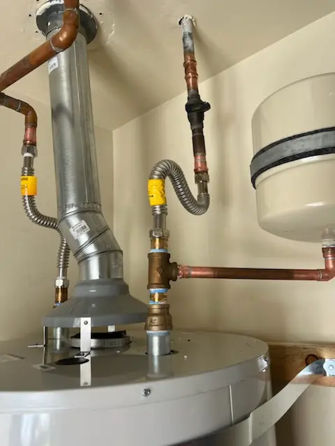 Water heater installation and plumbing repair in Manito